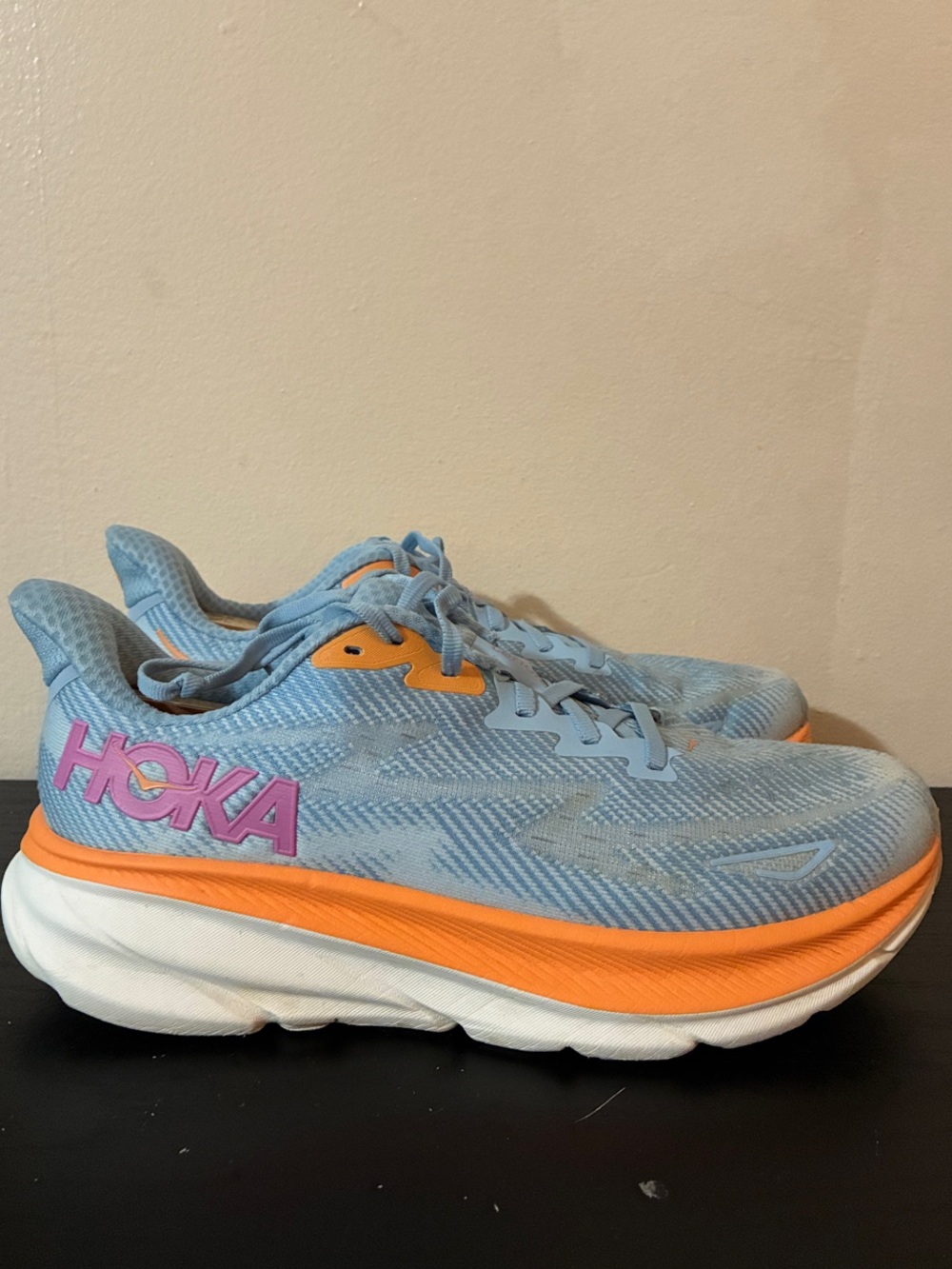 Hoka Clifton 9 running shoes, featuring an airy blue upper size 9
